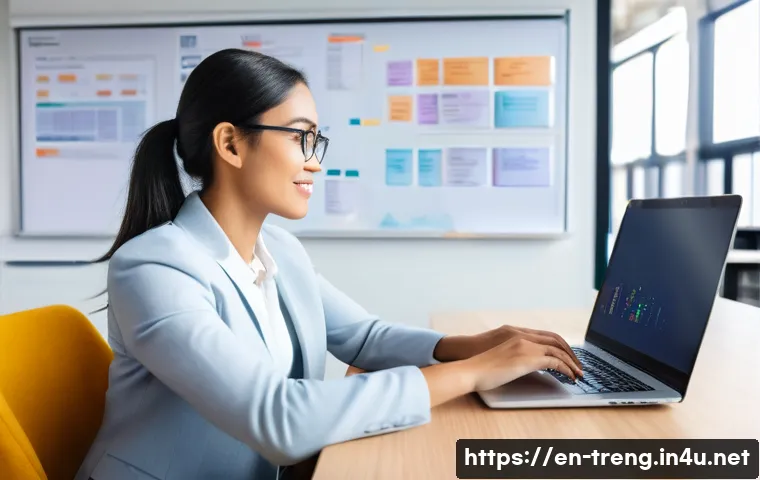 무역영어 학습과 업무 병행 팁 - A modern office setting showing a professional woman in business casual attire sitting at a sleek de...